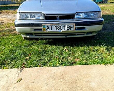 Серый Мазда 626, объемом двигателя 2 л и пробегом 318 тыс. км за 800 $, фото 1 на Automoto.ua