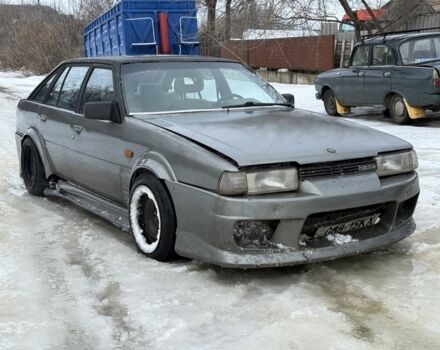 Серый Мазда 626, объемом двигателя 2 л и пробегом 300 тыс. км за 603 $, фото 1 на Automoto.ua