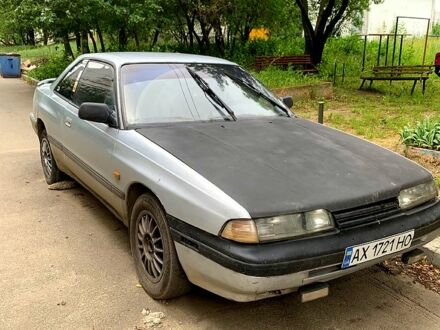 Серый Мазда 626, объемом двигателя 2.2 л и пробегом 425 тыс. км за 840 $, фото 1 на Automoto.ua