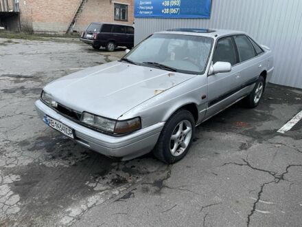 Сірий Мазда 626, об'ємом двигуна 2 л та пробігом 200 тис. км за 450 $, фото 1 на Automoto.ua