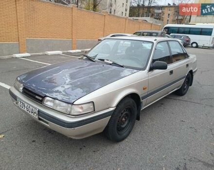 Серый Мазда 626, объемом двигателя 2 л и пробегом 449 тыс. км за 1300 $, фото 1 на Automoto.ua