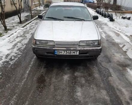 Серый Мазда 626, объемом двигателя 2 л и пробегом 225 тыс. км за 800 $, фото 1 на Automoto.ua