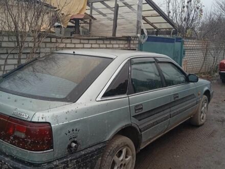 Серый Мазда 626, объемом двигателя 0 л и пробегом 238 тыс. км за 403 $, фото 1 на Automoto.ua