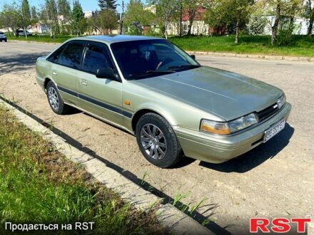 Серый Мазда 626, объемом двигателя 2 л и пробегом 400 тыс. км за 1500 $, фото 1 на Automoto.ua