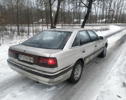 Серый Мазда 626, объемом двигателя 2 л и пробегом 357 тыс. км за 750 $, фото 1 на Automoto.ua