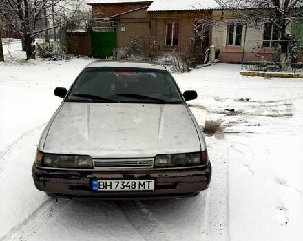 Серый Мазда 626, объемом двигателя 2 л и пробегом 2250 тыс. км за 650 $, фото 1 на Automoto.ua