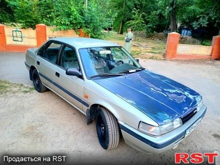 Сірий Мазда 626, об'ємом двигуна 2 л та пробігом 447 тис. км за 1300 $, фото 1 на Automoto.ua