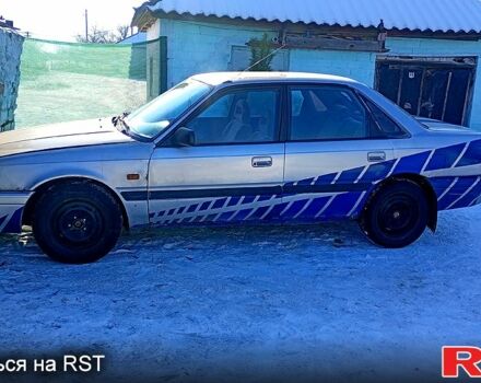 Серый Мазда 626, объемом двигателя 2 л и пробегом 10 тыс. км за 820 $, фото 1 на Automoto.ua