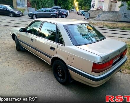 Серый Мазда 626, объемом двигателя 2 л и пробегом 447 тыс. км за 1300 $, фото 1 на Automoto.ua