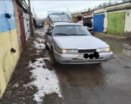 Серый Мазда 626, объемом двигателя 2 л и пробегом 300 тыс. км за 100 $, фото 1 на Automoto.ua