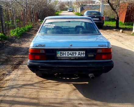 Серый Мазда 626, объемом двигателя 2 л и пробегом 350 тыс. км за 450 $, фото 1 на Automoto.ua
