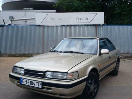 Серый Мазда 626, объемом двигателя 2 л и пробегом 400 тыс. км за 1299 $, фото 1 на Automoto.ua