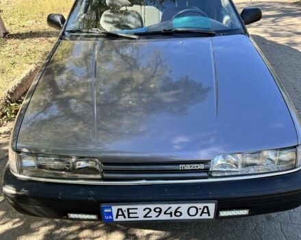 Серый Мазда 626, объемом двигателя 2 л и пробегом 387 тыс. км за 689 $, фото 1 на Automoto.ua