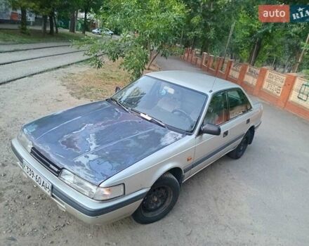 Серый Мазда 626, объемом двигателя 2 л и пробегом 447 тыс. км за 1300 $, фото 1 на Automoto.ua