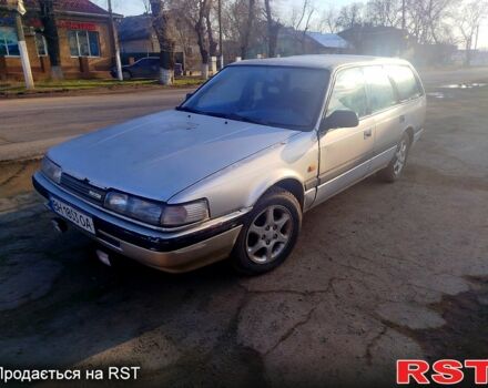 Серый Мазда 626, объемом двигателя 2 л и пробегом 250 тыс. км за 700 $, фото 1 на Automoto.ua