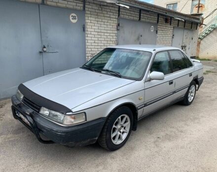 Серый Мазда 626, объемом двигателя 1.8 л и пробегом 363 тыс. км за 950 $, фото 1 на Automoto.ua