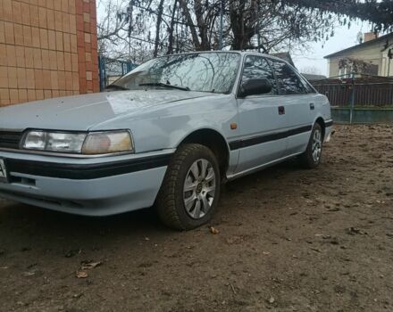 Серый Мазда 626, объемом двигателя 2 л и пробегом 650 тыс. км за 734 $, фото 1 на Automoto.ua