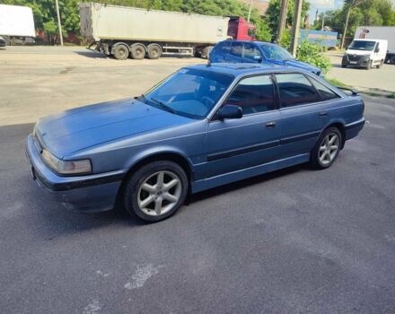 Серый Мазда 626, объемом двигателя 2 л и пробегом 300 тыс. км за 600 $, фото 1 на Automoto.ua