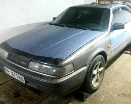 Серый Мазда 626, объемом двигателя 1.8 л и пробегом 400 тыс. км за 1050 $, фото 1 на Automoto.ua