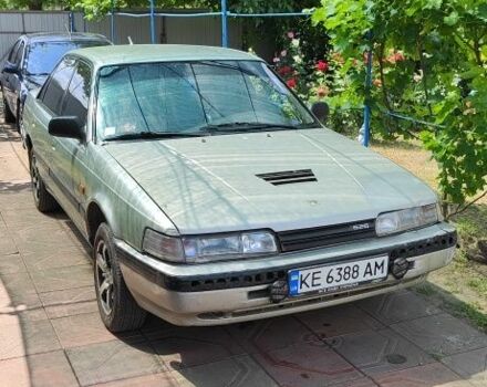 Серый Мазда 626, объемом двигателя 1.8 л и пробегом 580 тыс. км за 600 $, фото 1 на Automoto.ua