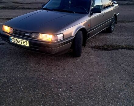 Серый Мазда 626, объемом двигателя 2 л и пробегом 400 тыс. км за 1100 $, фото 1 на Automoto.ua