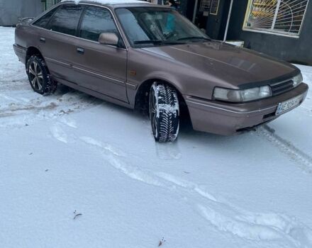 Сірий Мазда 626, об'ємом двигуна 2 л та пробігом 57 тис. км за 1300 $, фото 1 на Automoto.ua