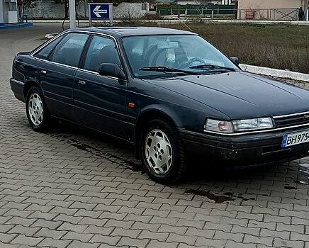 Серый Мазда 626, объемом двигателя 2.2 л и пробегом 200 тыс. км за 1150 $, фото 1 на Automoto.ua