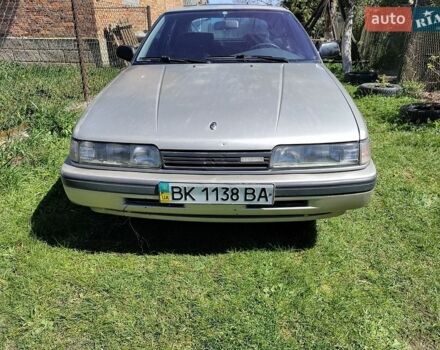 Серый Мазда 626, объемом двигателя 1.8 л и пробегом 325 тыс. км за 550 $, фото 1 на Automoto.ua