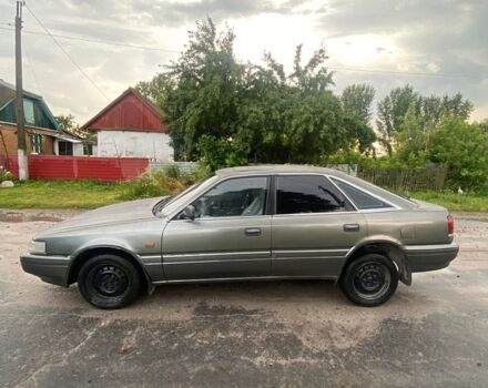 Серый Мазда 626, объемом двигателя 2 л и пробегом 340 тыс. км за 780 $, фото 1 на Automoto.ua