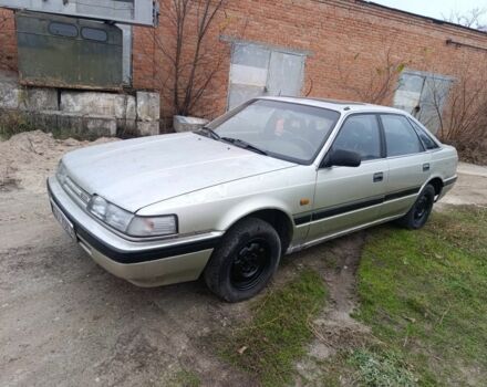 Серый Мазда 626, объемом двигателя 2 л и пробегом 280 тыс. км за 1300 $, фото 1 на Automoto.ua