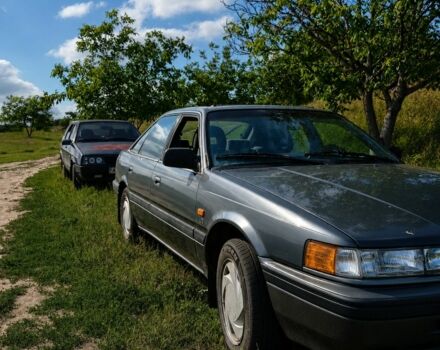 Серый Мазда 626, объемом двигателя 2 л и пробегом 265 тыс. км за 895 $, фото 1 на Automoto.ua