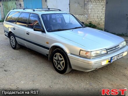 Серый Мазда 626, объемом двигателя 2 л и пробегом 290 тыс. км за 999 $, фото 1 на Automoto.ua