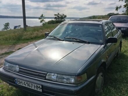 Серый Мазда 626, объемом двигателя 2 л и пробегом 221 тыс. км за 1117 $, фото 1 на Automoto.ua