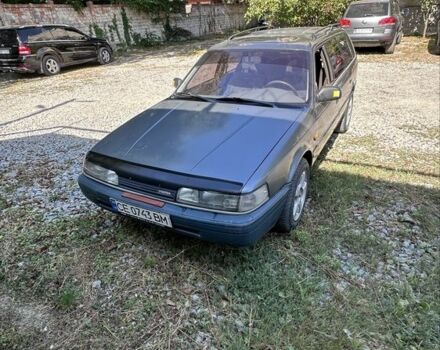 Серый Мазда 626, объемом двигателя 2 л и пробегом 380 тыс. км за 800 $, фото 1 на Automoto.ua