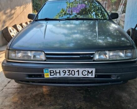 Серый Мазда 626, объемом двигателя 2 л и пробегом 220 тыс. км за 1300 $, фото 1 на Automoto.ua