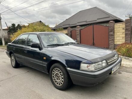 Сірий Мазда 626, об'ємом двигуна 2 л та пробігом 500 тис. км за 1051 $, фото 1 на Automoto.ua