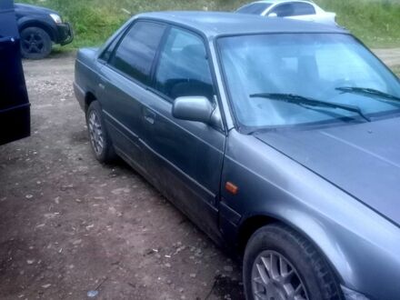 Серый Мазда 626, объемом двигателя 2 л и пробегом 660 тыс. км за 950 $, фото 1 на Automoto.ua