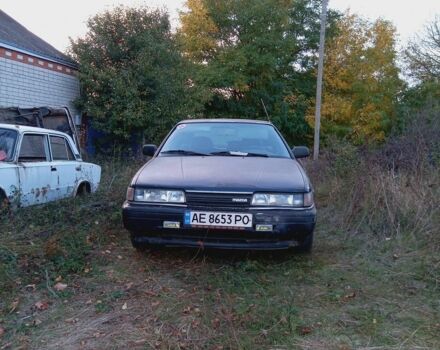 Серый Мазда 626, объемом двигателя 2 л и пробегом 300 тыс. км за 550 $, фото 1 на Automoto.ua