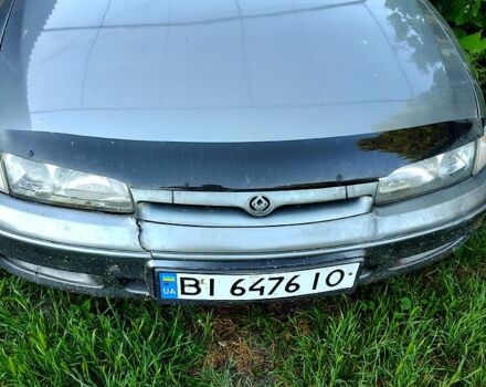 Серый Мазда 626, объемом двигателя 2 л и пробегом 243 тыс. км за 1250 $, фото 1 на Automoto.ua