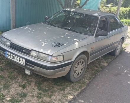 Серый Мазда 626, объемом двигателя 2 л и пробегом 5 тыс. км за 751 $, фото 1 на Automoto.ua