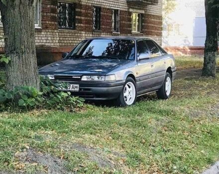 Серый Мазда 626, объемом двигателя 2 л и пробегом 580 тыс. км за 700 $, фото 1 на Automoto.ua