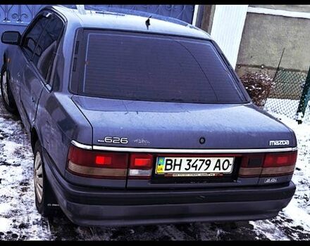 Серый Мазда 626, объемом двигателя 2 л и пробегом 300 тыс. км за 1500 $, фото 1 на Automoto.ua