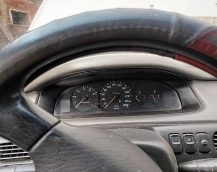 Серый Мазда 626, объемом двигателя 2 л и пробегом 370 тыс. км за 650 $, фото 1 на Automoto.ua