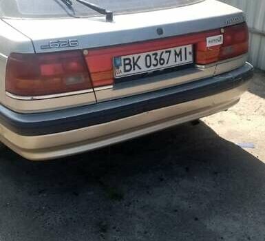 Сірий Мазда 626, об'ємом двигуна 2 л та пробігом 300 тис. км за 345 $, фото 1 на Automoto.ua