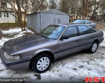 Серый Мазда 626, объемом двигателя 2 л и пробегом 200 тыс. км за 1100 $, фото 1 на Automoto.ua