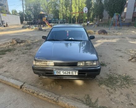 Серый Мазда 626, объемом двигателя 2 л и пробегом 326 тыс. км за 1200 $, фото 1 на Automoto.ua