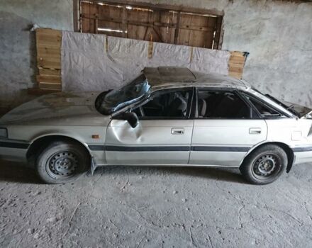 Серый Мазда 626, объемом двигателя 2 л и пробегом 215 тыс. км за 900 $, фото 1 на Automoto.ua