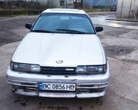 Серый Мазда 626, объемом двигателя 2 л и пробегом 300 тыс. км за 400 $, фото 1 на Automoto.ua