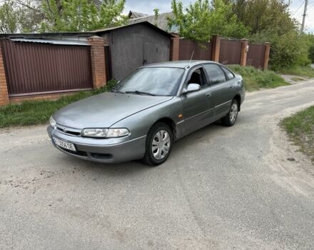 Серый Мазда 626, объемом двигателя 1.8 л и пробегом 250 тыс. км за 1200 $, фото 1 на Automoto.ua