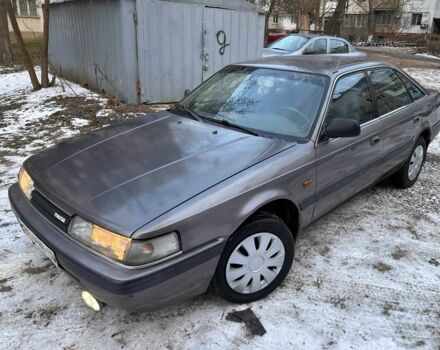 Серый Мазда 626, объемом двигателя 2 л и пробегом 200 тыс. км за 1150 $, фото 1 на Automoto.ua